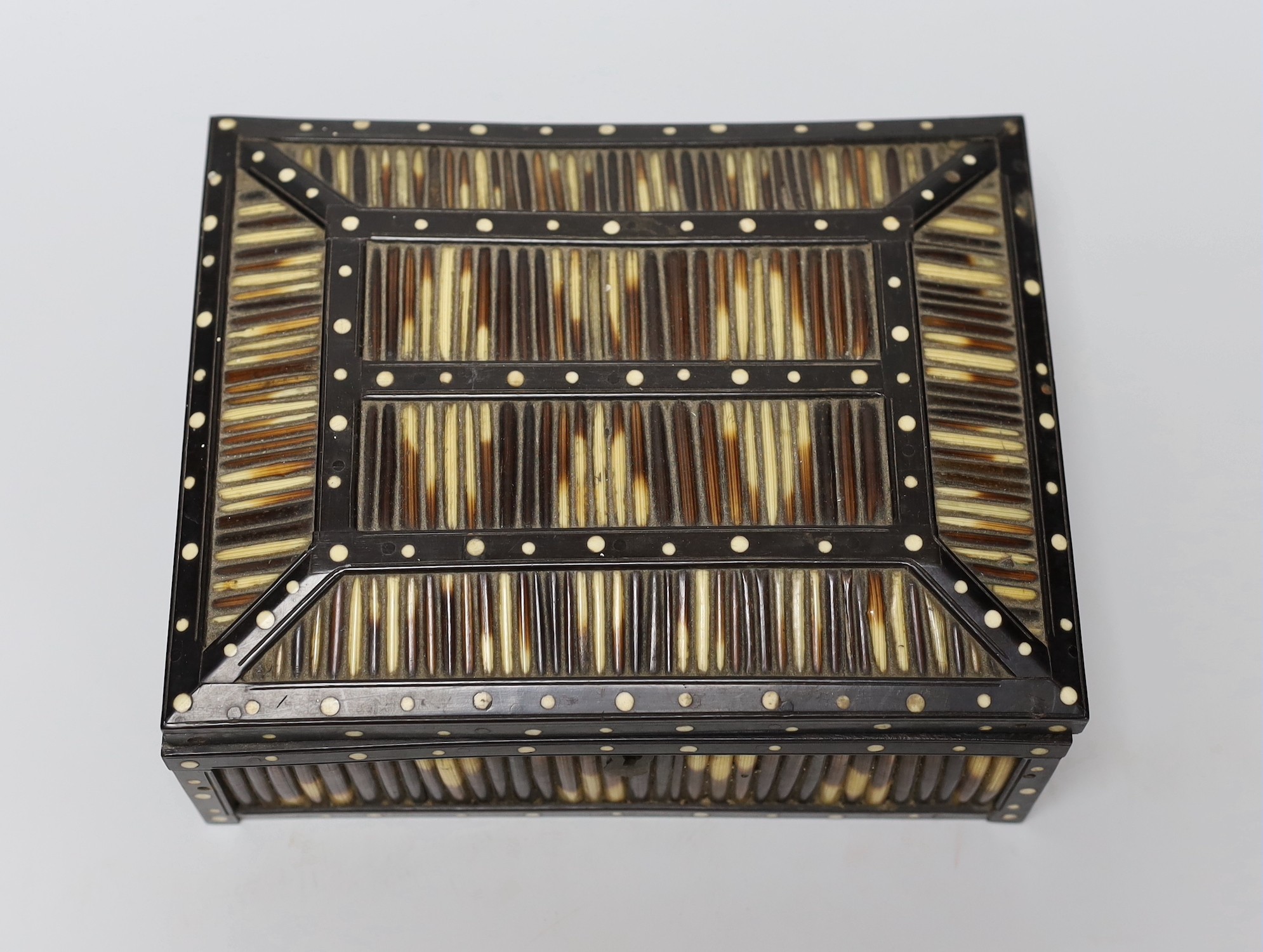 An Indian bone inlaid ebony and porcupine quill rectangular box, 20cm